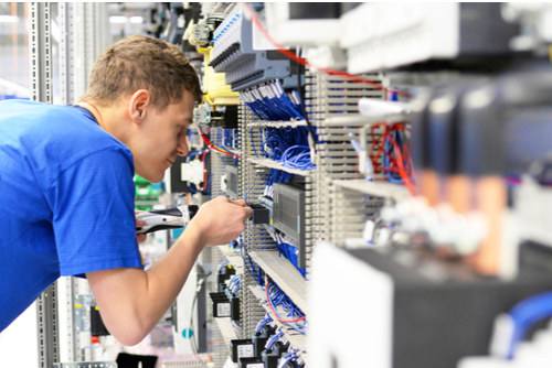 Engineer looking at machines