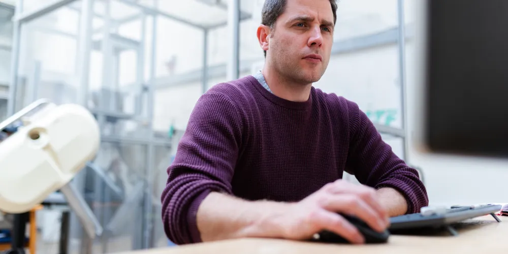 Engineer looking at computer